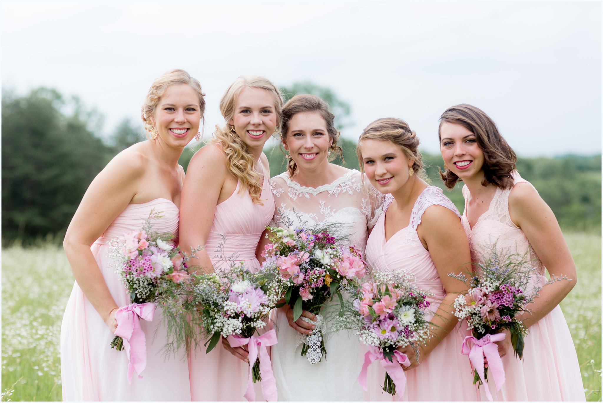Pink and lace bridesmaids and florals